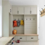 Custom white oak mudroom bench with lockers in a Minneapolis home